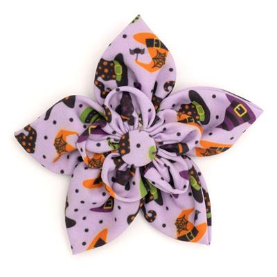 Halloween-themed flower accessory with purple and orange design on a white background