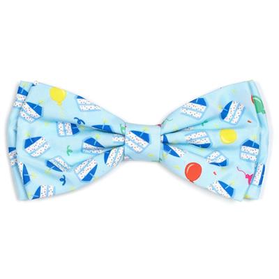 Colorful bow tie with cartoon designs on a light blue background