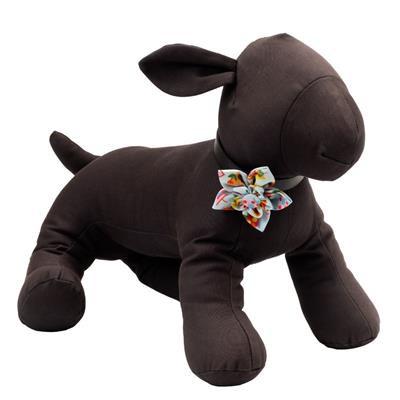 Brown plush dog toy with a colorful bow tie on a white background