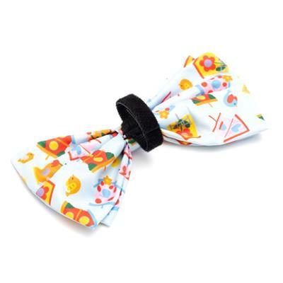 Colorful bow tie with colorful birdhouses and a black Velcro strap on a white background