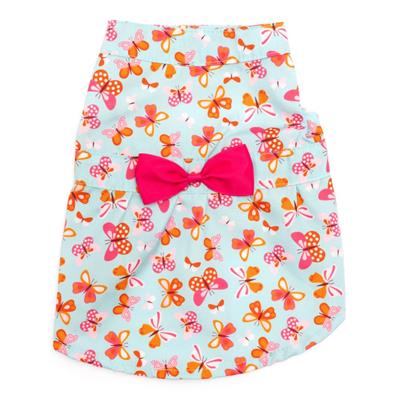 Dog dress with butterfly pattern and pink bow on a white background