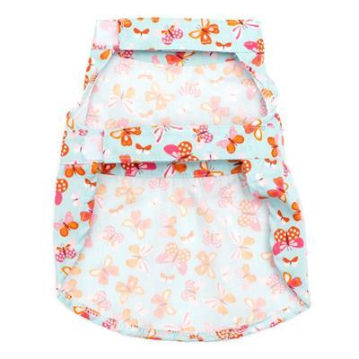 Floral-patterned dog dress with velcro closures on a white background