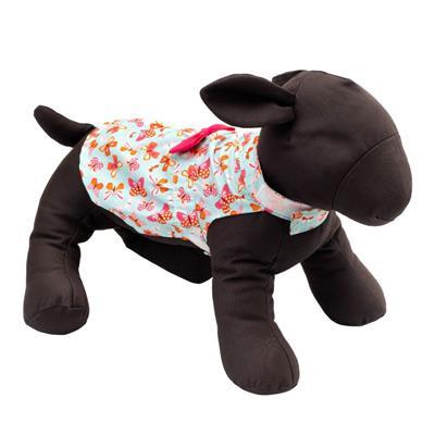 Plush dog toy wearing a floral-patterned outfit on a white background