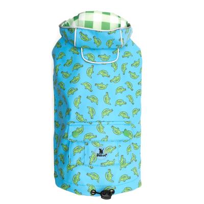 Blue dog coat with green crocodile pattern on a white background