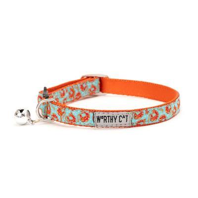 Cat collar with turquoise pattern and orange accents on a white background
