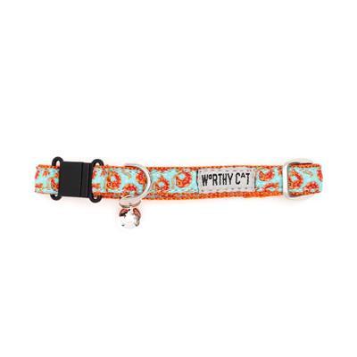 Cat collar with turquoise pattern and orange accents on a white background