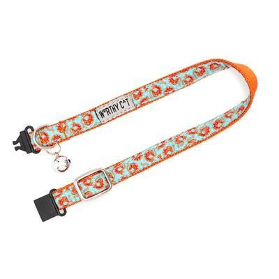 Cat collar with turquoise pattern and orange accents on a white background