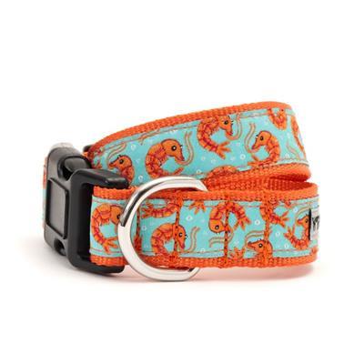 Dog collar with orange and blue design featuring sea creatures on a white background