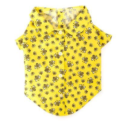 Yellow dog shirt with bee pattern on a white background