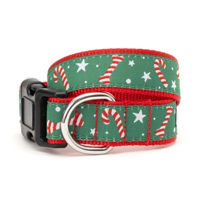 Dog collar with Christmas candy cane pattern on a green background