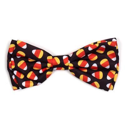 Bow tie with candy corn pattern on a black background