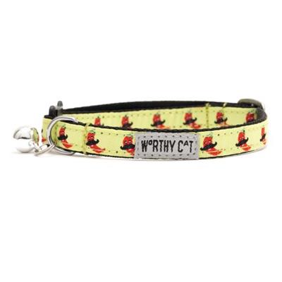 Cat collar with red chili pepper pattern and 'Worthy Cat' tag on a white background
