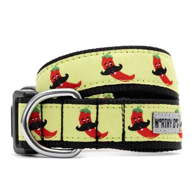 Dog collar with red chili pepper pattern on a yellow background
