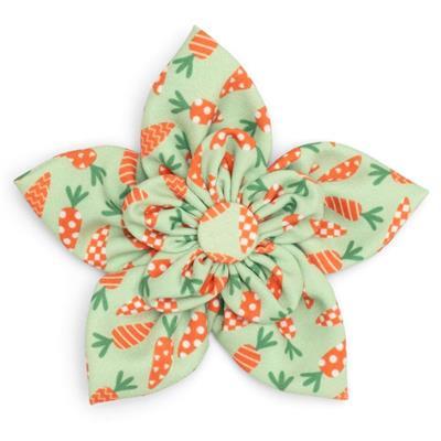 Fabric flower with carrot pattern on a white background