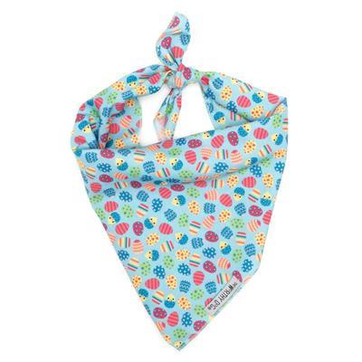 Colorful patterned dog bandana on a white background