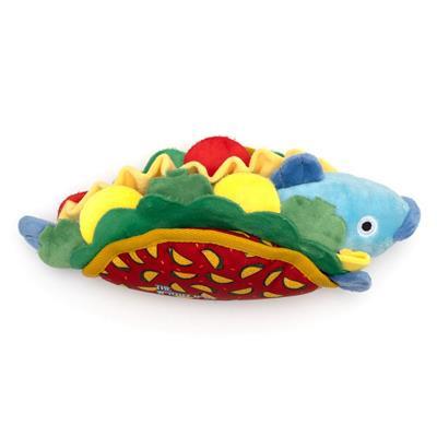 Colorful plush toy resembling a taco with a blue fish on a white background