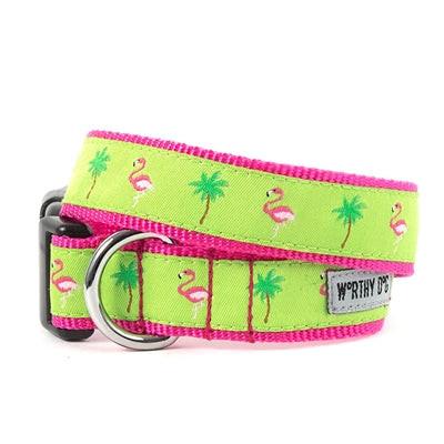 Neon green dog collar with pink flamingo and palm tree pattern on a white background