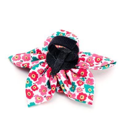 Floral-patterned collar bow with a black Velcro touch closure on a white background