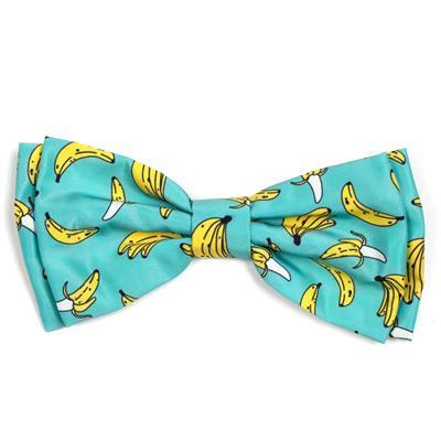 Bow tie with banana pattern on a turquoise background