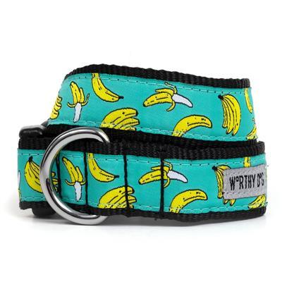 Green dog collar featuring a banana pattern on white backgroun