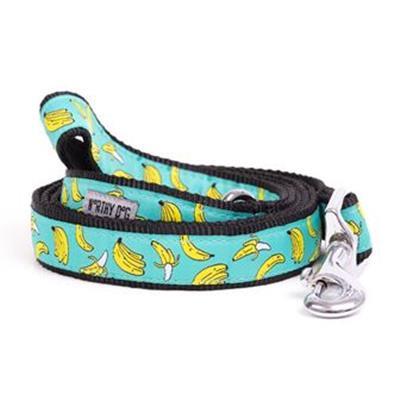 Green dog leash featuring a banana pattern on white background