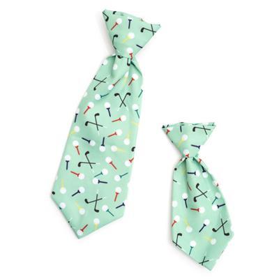 Two green dog collars with golf-themed pattern on a white background