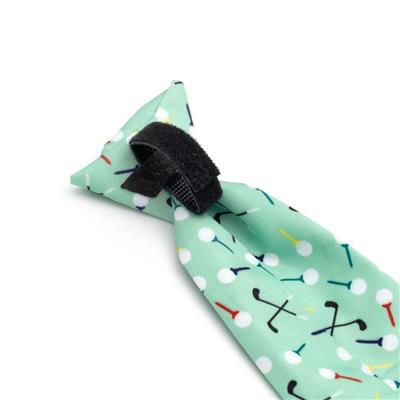 Dog tie with golf-themed pattern on a white background