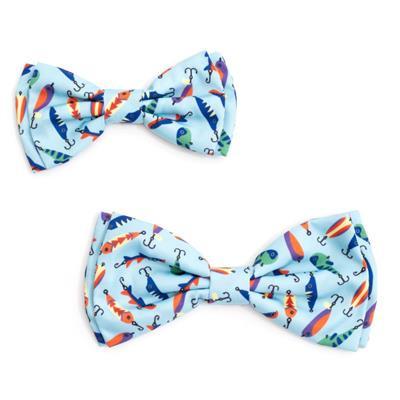 Two bow ties with a colorful fishing pattern on a white background