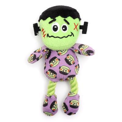 Plush toy resembling a character with green skin, black hair, and purple outfit on a white background
