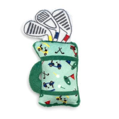 Toy golf bag with golf clubs on a white background