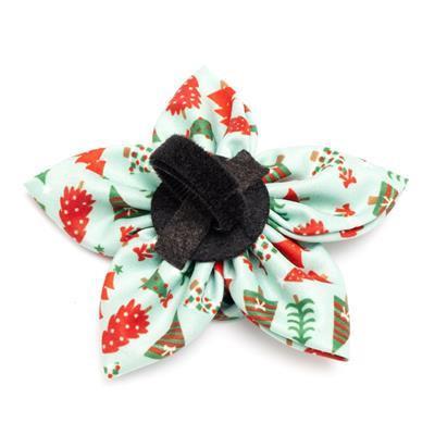 Christmas-themed collar bow with festive pattern on a white background
