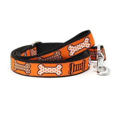 Orange & black Dog leash with bone pattern on orange background