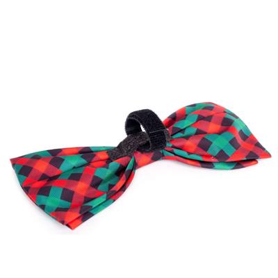Plaid bow tie with black Velcro band on a white background