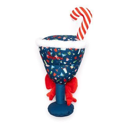 Blue dog toy shaped like cocktail glasses with cocktail patterns, candy cane and red bow on white background