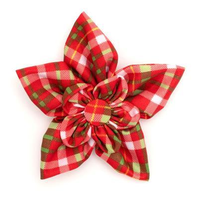 Red and green plaid bow on a white background