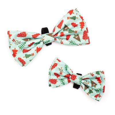 Two bow ties with festive pattern on a white background