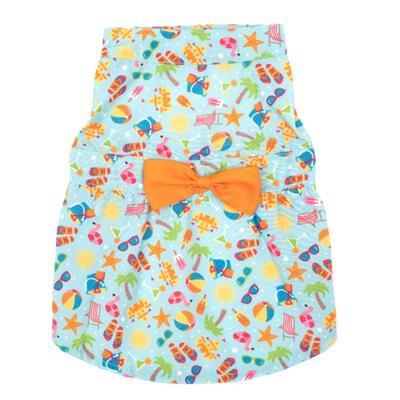 Colorful patterned dog dress with an orange bow on a white background
