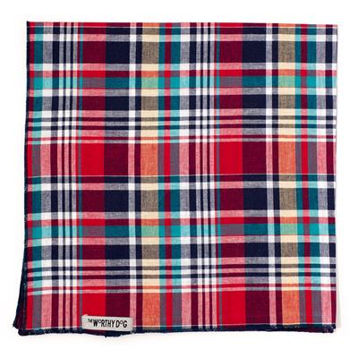 Plaid pet bandana with red, blue, and green colors on a white background