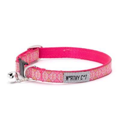 Pink cat collar with decorative pattern and 'Worthy Cat' tag on a white background
