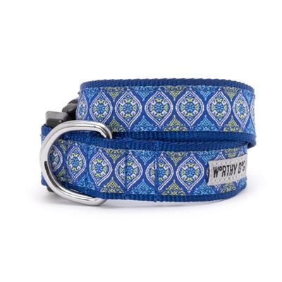 Blue patterned dog collar with metal D-ring and snap closure buckle on a white background