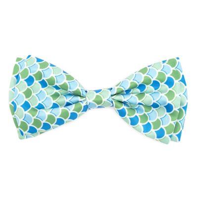 Green and blue patterned bow tie on a white background