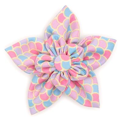 Pastel patterned hair bow on a white background