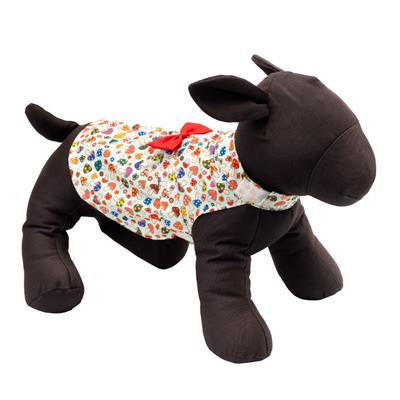 Plush toy dog with a colorful floral patterned outfit on a white background