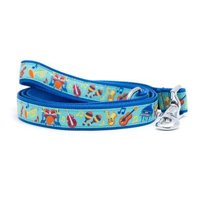 Dog leash with musical instrument pattern on a white background