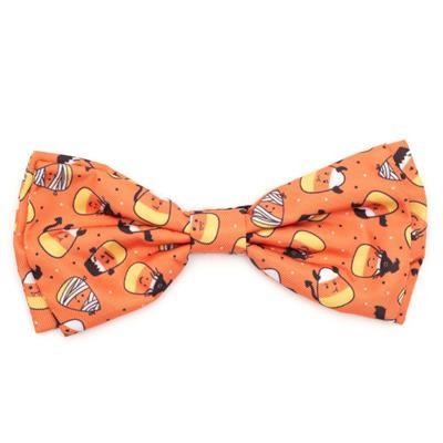 Orange bow tie with Halloween-themed pattern on a white background