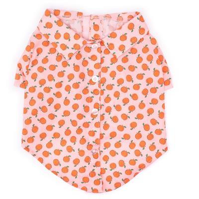 Dog shirt with orange peach pattern on a pink background