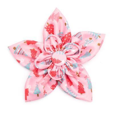 Pink floral collar bow with Christmas tree pattern on a white background