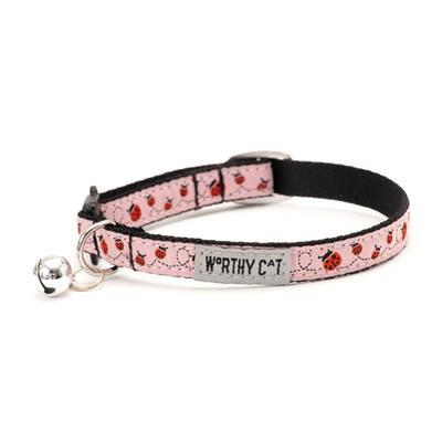 Cat collar with ladybug pattern and 'Worthy Cat' branding on a white background