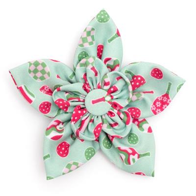 Floral fabric bow with pickleball racquet pattern on a white background