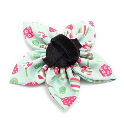 Floral patterned collar bow with black velcro touch closure on a white background
